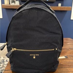 Michael Kors Navy Backpack with Gold Accents